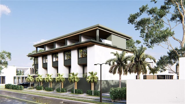 107 W Acapulco St Unit 2, South Padre Island, TX 78597 - view of side of home with stucco siding