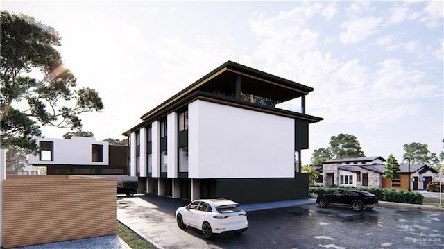 107 W Acapulco St Unit 2, South Padre Island, TX 78597 - view of side of home with stucco siding