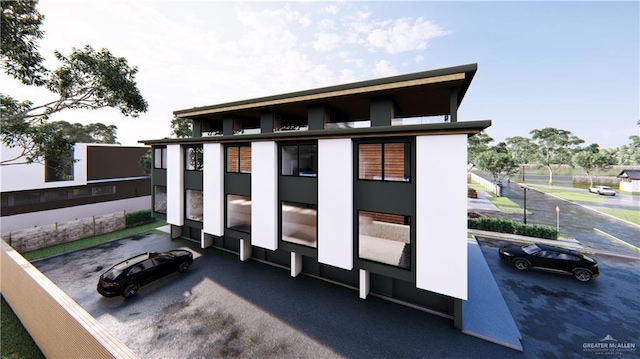 107 W Acapulco St Unit 2, South Padre Island, TX 78597 - rear view of house with stucco siding
