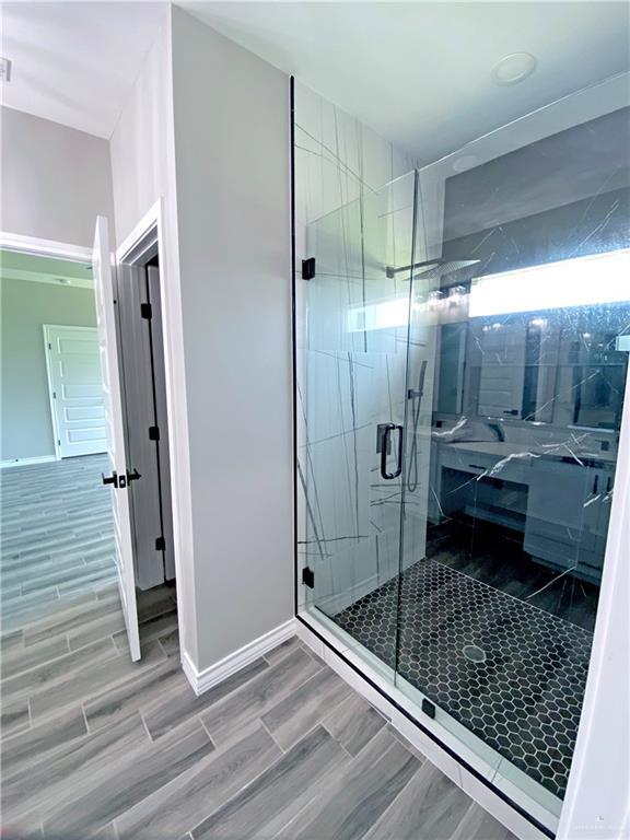 bathroom featuring walk in shower