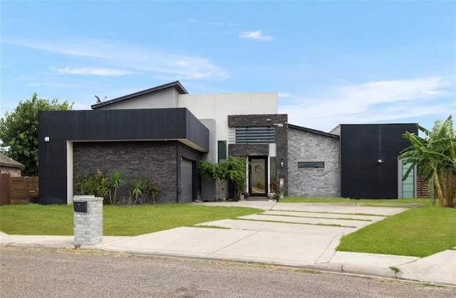 contemporary house with a front lawn