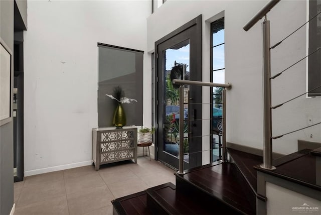 doorway featuring light tile patterned floors