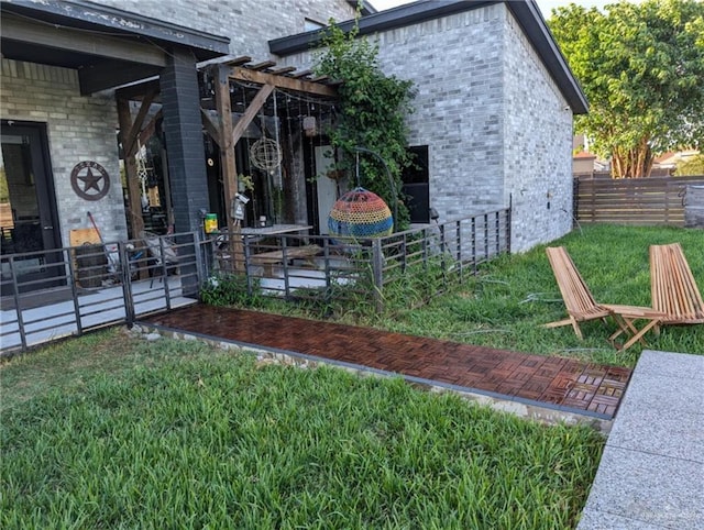 view of home's exterior with a yard