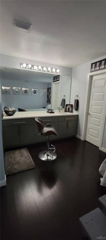 bathroom with wood-type flooring