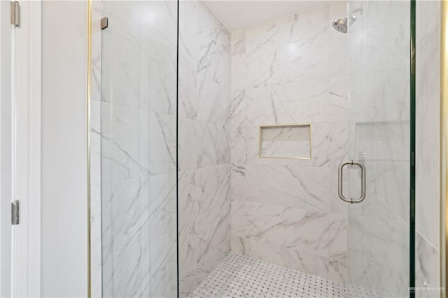 full bathroom with a shower stall