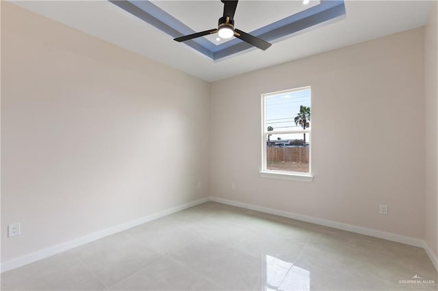 spare room with ceiling fan