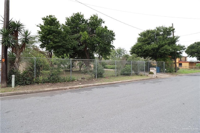 view of road featuring curbs