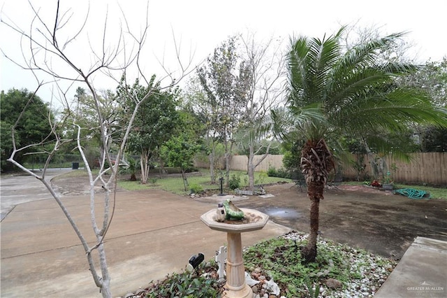 exterior space with a fenced backyard and a patio