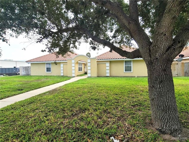 view of front of property with a front lawn