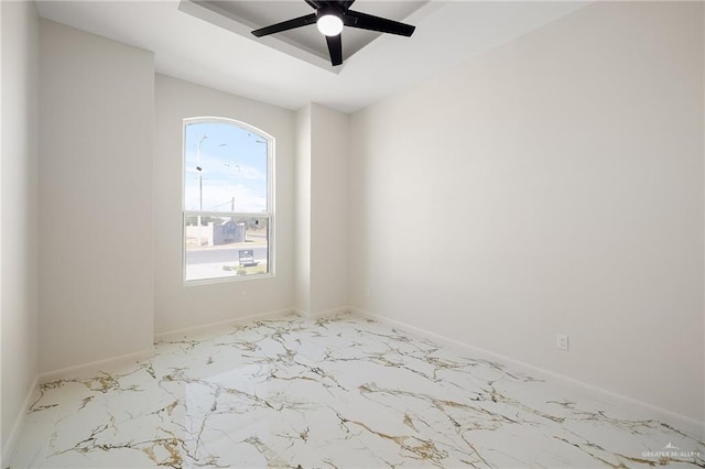 unfurnished room with ceiling fan