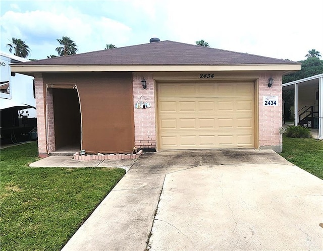 2434 Starling Cir E, Palmview, TX 78572 - garage with concrete driveway