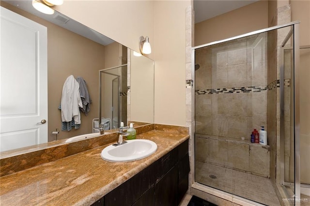 bathroom featuring vanity and walk in shower