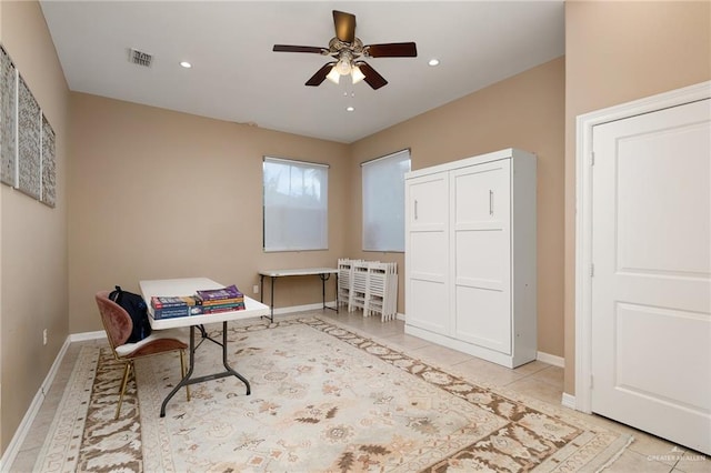 tiled office with ceiling fan