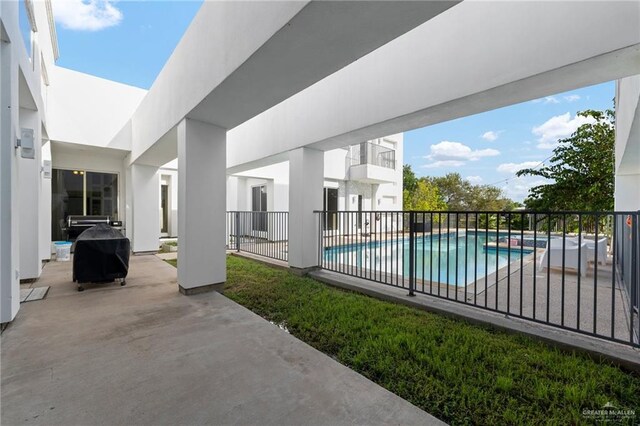 view of pool with a patio area