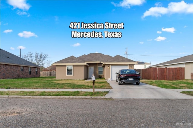 view of front facade featuring a garage and a front yard