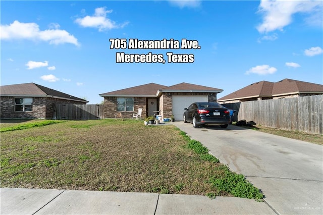 ranch-style home featuring a garage and a front yard