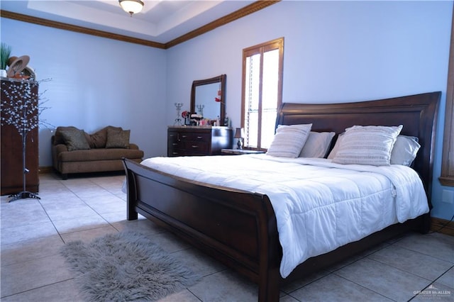 tiled bedroom with a tray ceiling and ornamental molding