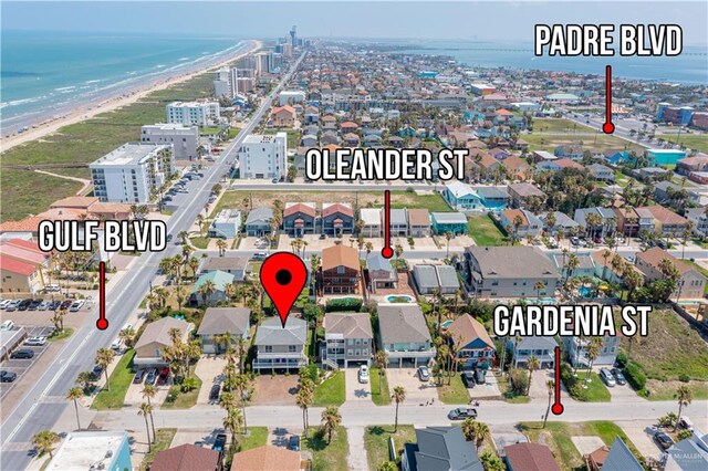 aerial view with a view of the beach and a water view