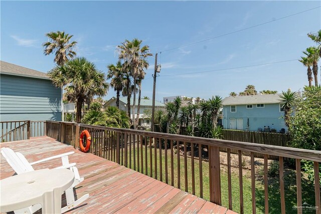 wooden deck with a yard