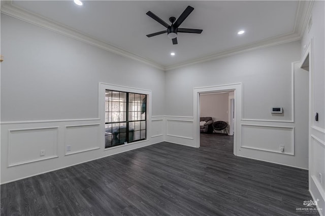 empty room with dark hardwood / wood-style floors, ceiling fan, and crown molding