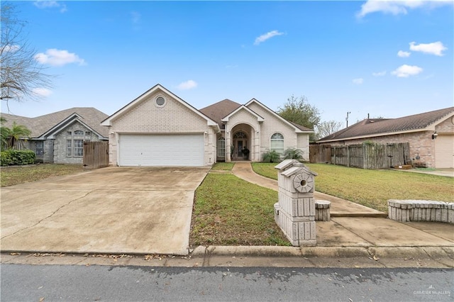 ranch-style house with a front lawn and a garage