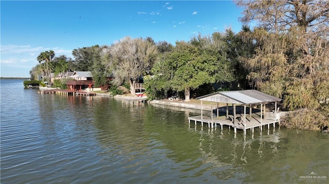 view of dock with a water view