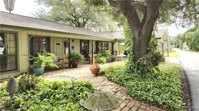 exterior space featuring covered porch