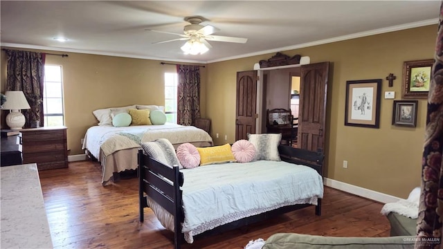 bedroom with ceiling fan, dark hardwood / wood-style flooring, and crown molding