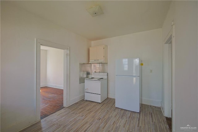 kitchen featuring white cabinetry, white appliances, and light wood-type flooring