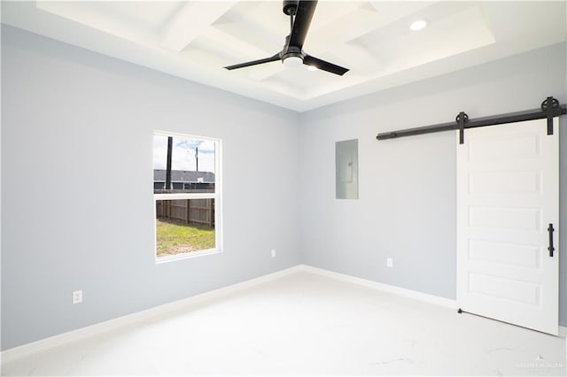 unfurnished room with a barn door, coffered ceiling, ceiling fan, electric panel, and beamed ceiling