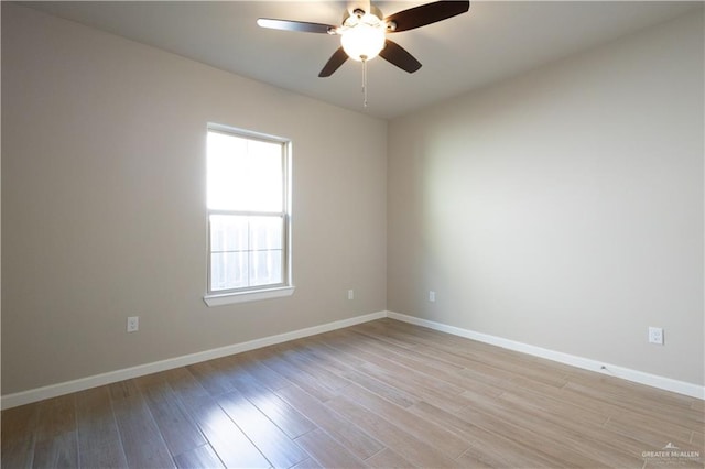 unfurnished room with ceiling fan and light hardwood / wood-style floors