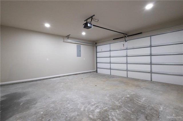 garage featuring a garage door opener and electric panel