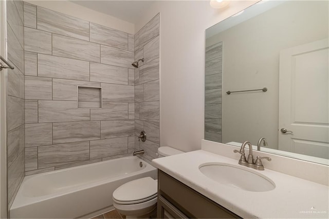 bathroom with shower / washtub combination, vanity, and toilet