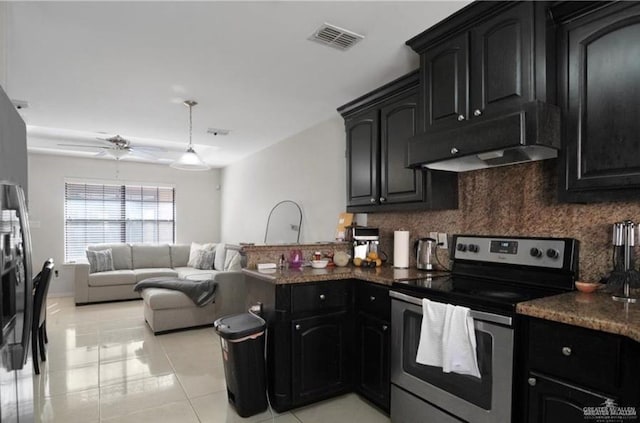 kitchen featuring ceiling fan, decorative backsplash, stainless steel range with electric cooktop, and light tile patterned floors