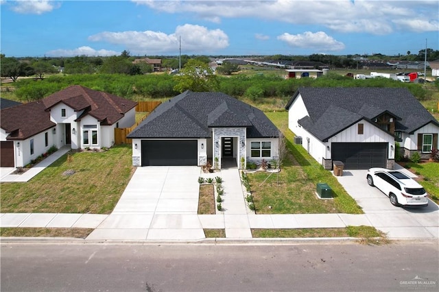 modern farmhouse with a garage and a front yard