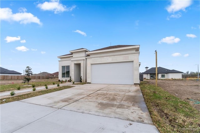 view of front of property featuring a garage