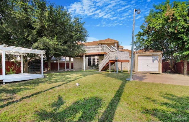 5605 N 41st St, Mcallen, TX 78504 - view of yard featuring a wooden deck, an outdoor structure, a pergola, and stairs