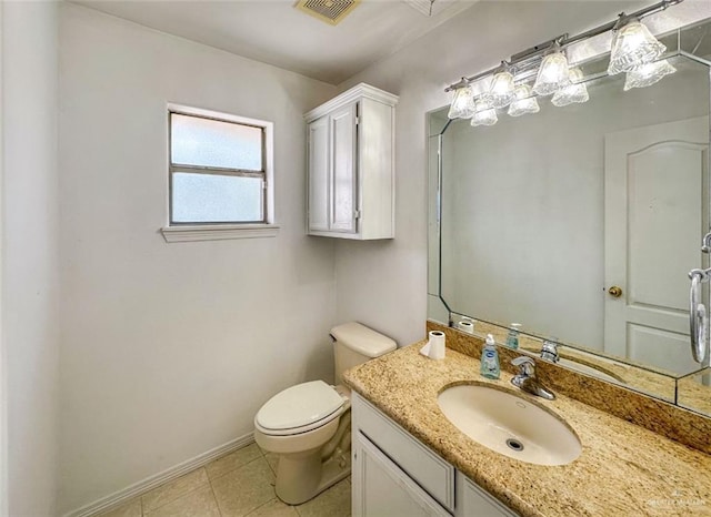 5605 N 41st St, Mcallen, TX 78504 - bathroom featuring toilet, tile patterned floors, baseboards, and vanity