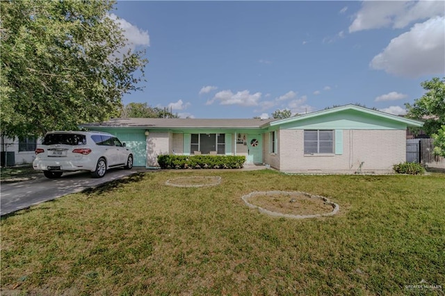 1124 N 28th St, Mcallen, TX 78501 - ranch-style house with brick siding and concrete driveway