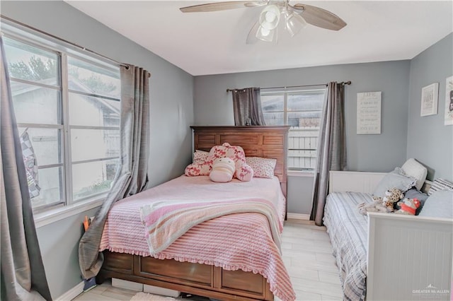 1124 N 28th St, Mcallen, TX 78501 - bedroom with baseboards and ceiling fan