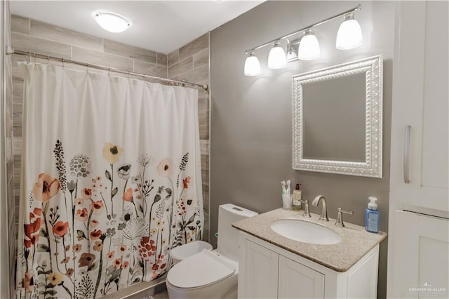 1124 N 28th St, Mcallen, TX 78501 - bathroom with vanity, toilet, and tiled shower