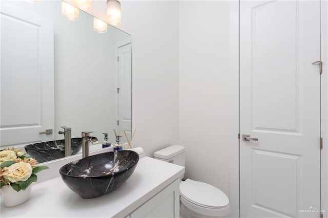 5703 N 44th Ln, Mcallen, TX 78504 - bathroom featuring vanity and toilet