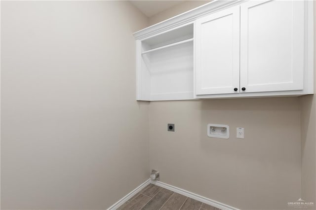 washroom featuring cabinets, hookup for an electric dryer, and washer hookup