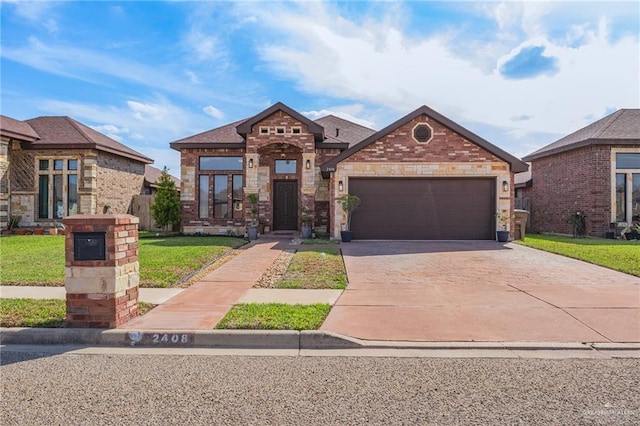 view of front facade with brick siding, a front yard, a garage, stone siding, and driveway