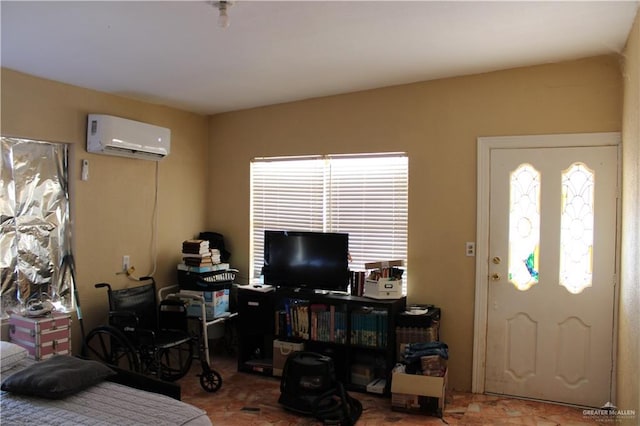 entryway featuring a wall unit AC