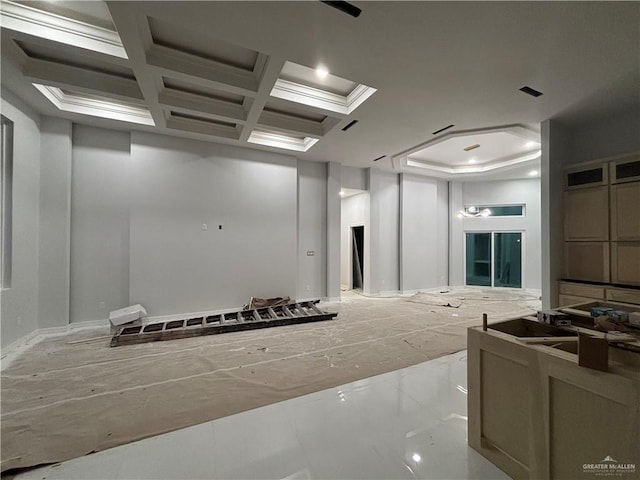 interior space featuring beam ceiling and coffered ceiling