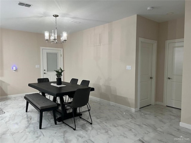 2429 Summer Breeze St, Mission, TX 78574 - dining room with baseboards, marble finish floor, a chandelier, and visible vents