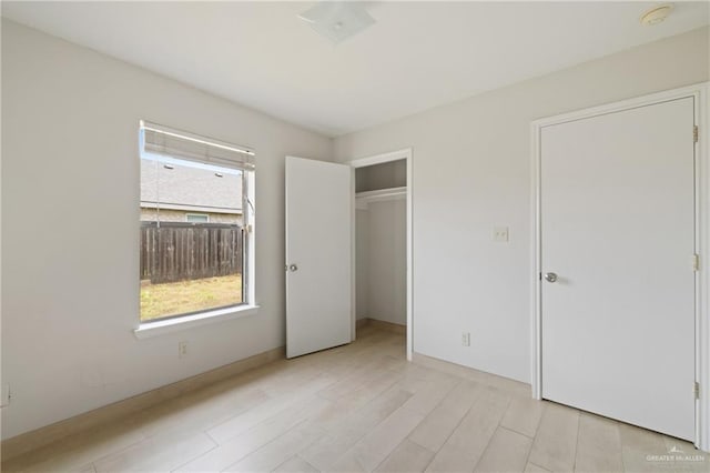 2216 Fairmont Ave, Mcallen, TX 78504 - unfurnished bedroom with a closet and light wood-style flooring