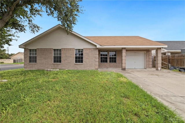 2216 Fairmont Ave, Mcallen, TX 78504 - ranch-style house featuring an attached garage, concrete driveway, and brick siding
