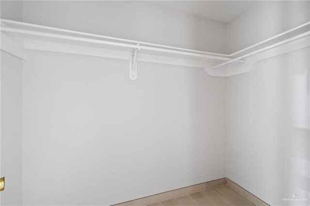 2216 Fairmont Ave, Mcallen, TX 78504 - walk in closet featuring light wood finished floors
